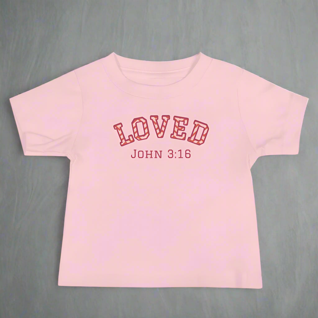 Baby pink short sleeve t-shirt with bible verse Loved John 3:16 