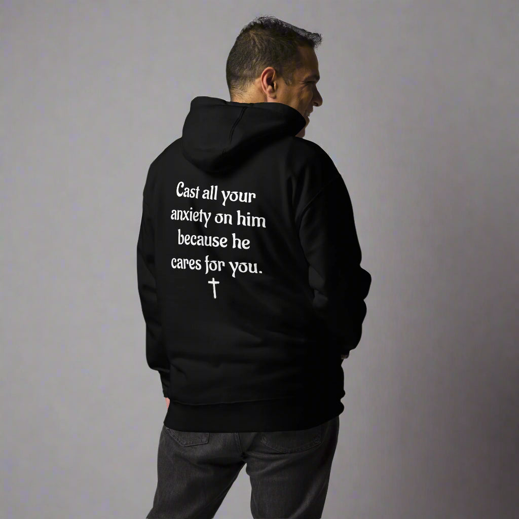 Unisex black hoodies with verse praise logo on the front, 1 Peter 5:7 on left sleeve, Cast all your anxiety on him because he cares for you with cross