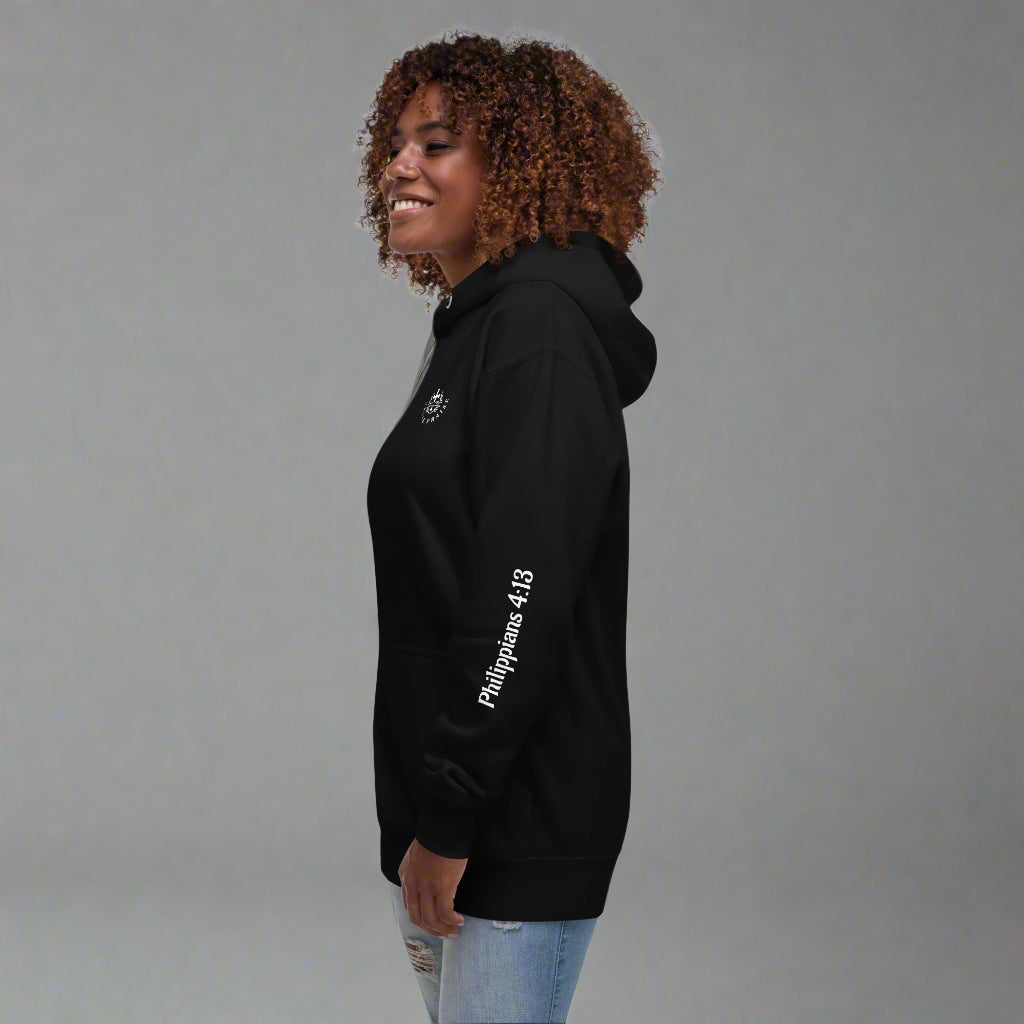 Unisex black hoodie with Philippians 4:13 on left sleeve