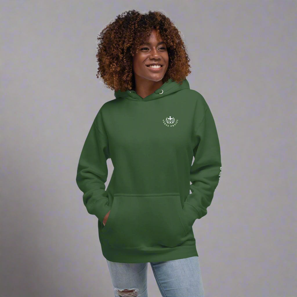 Unisex forest green hoodies with verse praise logo on the front, Romans 12:2 on left sleeve, Do not be conformed to this world but be transformed by the renewal of your mind with cross