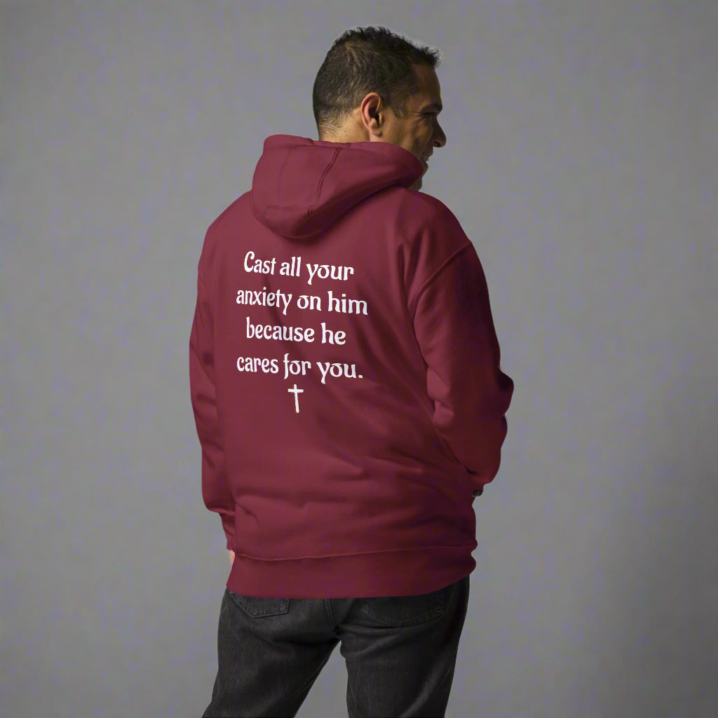 Unisex maroon hoodies with verse praise logo on the front, Romans 12:2 on left sleeve, Do not be conformed to this world but be transformed by the renewal of your mind with cross