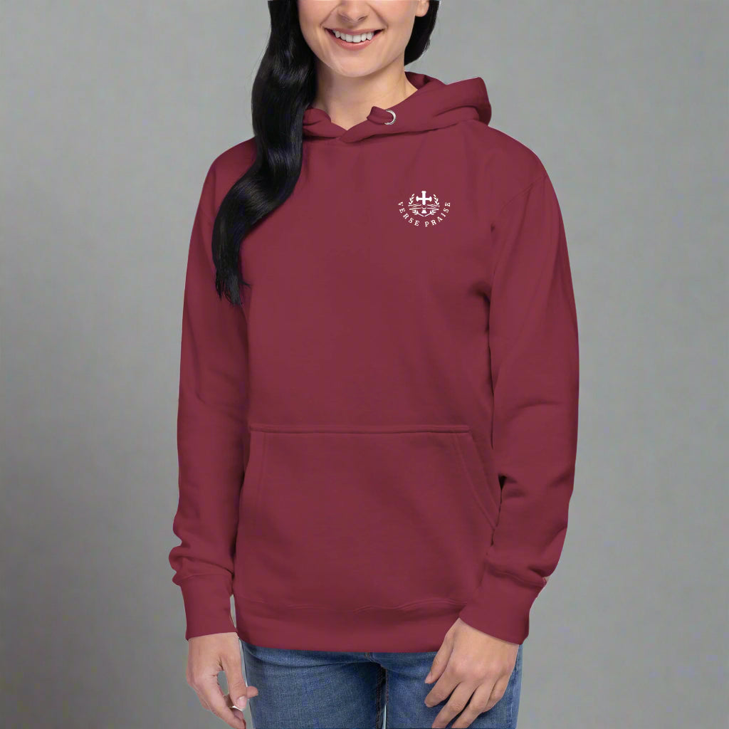 Unisex maroon hoodies with verse praise logo on the front, Romans 8:28 on left sleeve, And we know that in all things God works for the good of those who love him verse with cross